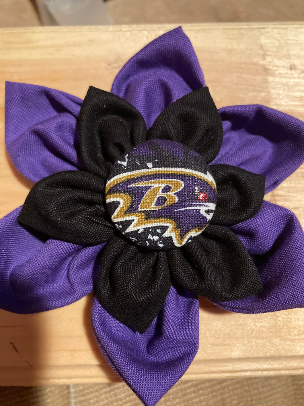 Nicole's custom Baltimore pet flower in purple and black