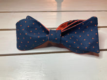 Load image into Gallery viewer, Navy blue and dark orange polka dot cotton, self tie bow tie , butterfly styled adjustable with up to 20&quot;  neck