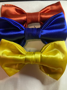 Chris Crawford's  trio of pre-tied satin bow ties , navy blue , yellow and  burnt orange