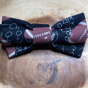 Kids football themed black, brown, and white  cotton bow tie with up to 16 inch adjustable neck strap
