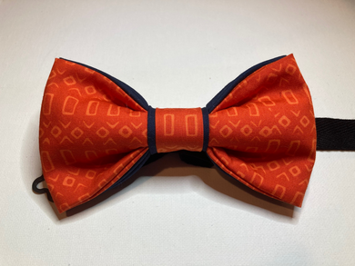 The Amiri-This bright and bold orange  with blue accent  batik cotton print bow tie.