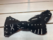 Load image into Gallery viewer, African inspired black mudcloth print styled self tie , cotton ,butterfly sized, bow tie with up to 20&#39; adjustable neck