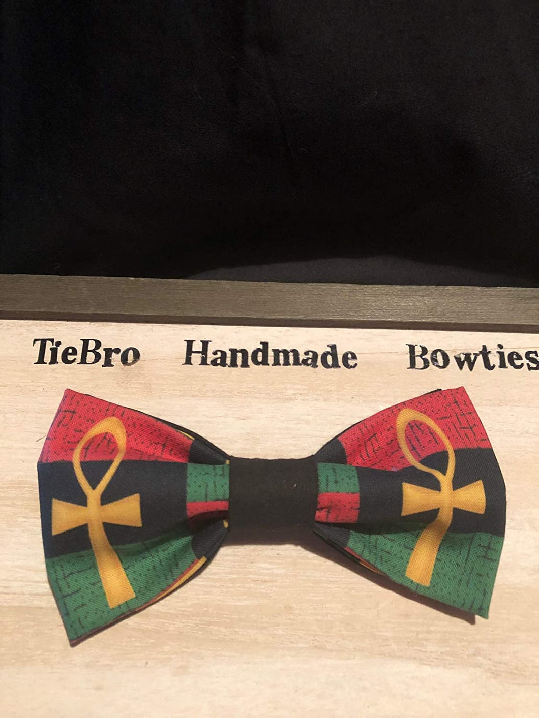 Red, Black and Green Ankh cotton bow tie, pre-tied with black cotton twill adjustable strap up to 18