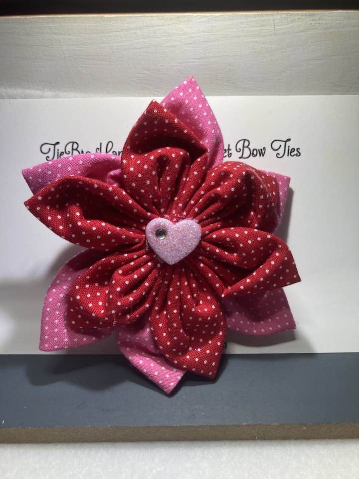 Pink and red with white polka dots pet flower with velcro closure