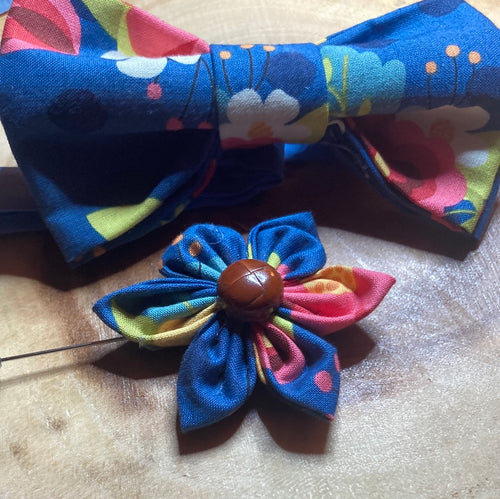 Vibrant navy blue and pastel tones floral cotton adult sized bow tie with coordinated cotton strap and lapel pin