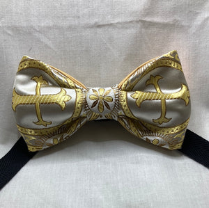 Ivory and gold religious cross woven satin adult sized bow tie, with up to 20' adjustable strap