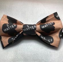 Load image into Gallery viewer, I matter, Black Lives matter themed cotton bow tie  pre-tied with up to 20 inch adjustable black cotton twill strap